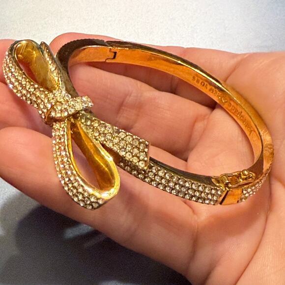 Kate Spade Crystal Bow Gold Tone Hinged Bracelet - Picture 1 of 9